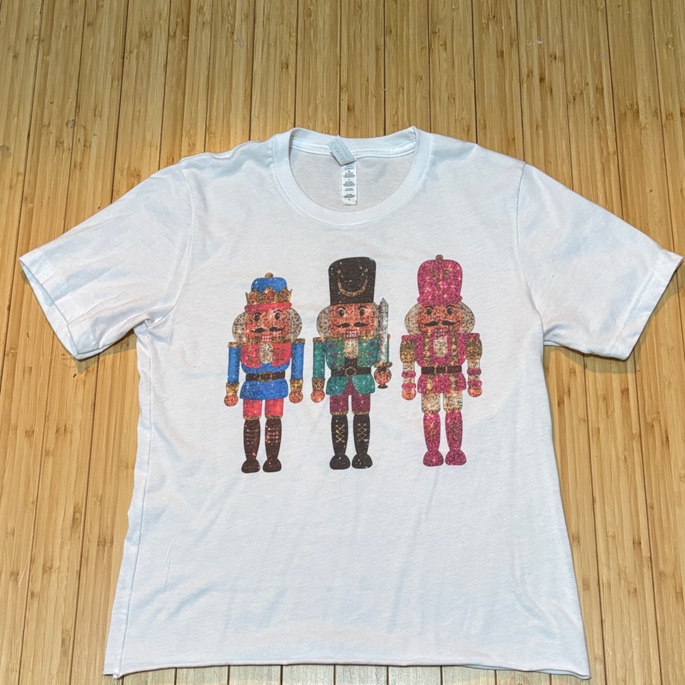 Women’s graphic Nutcracker tee. Raw hem. Size S. Worn once.
